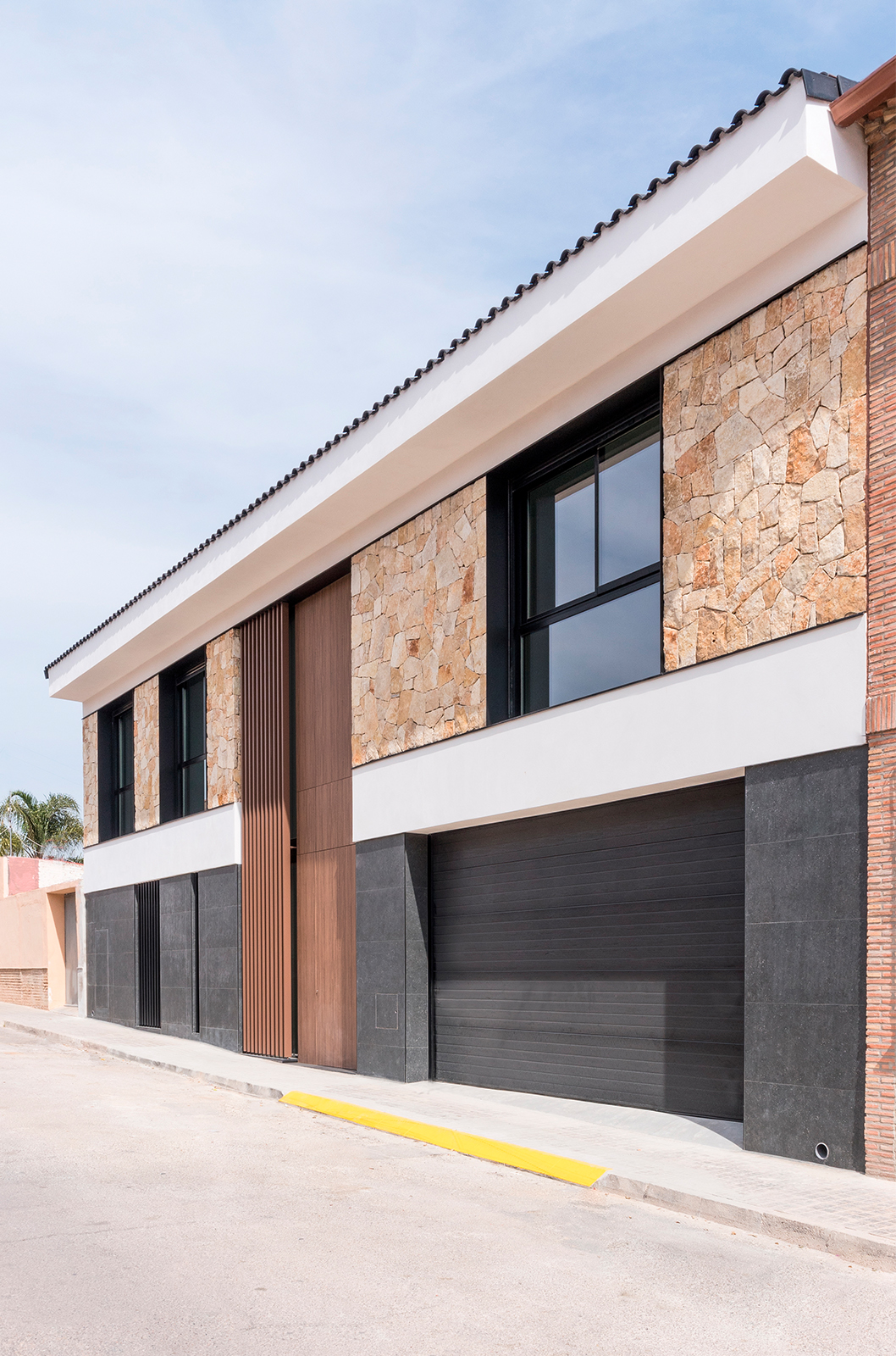 Fachada en vivienda ejecutada por la constructora AT4 en Valencia